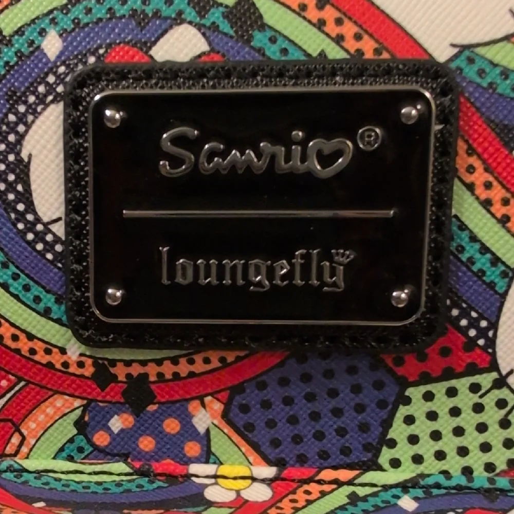 Loungefly Sanrio Hello Kitty All Over Print Multicolor Mini Backpack NWT